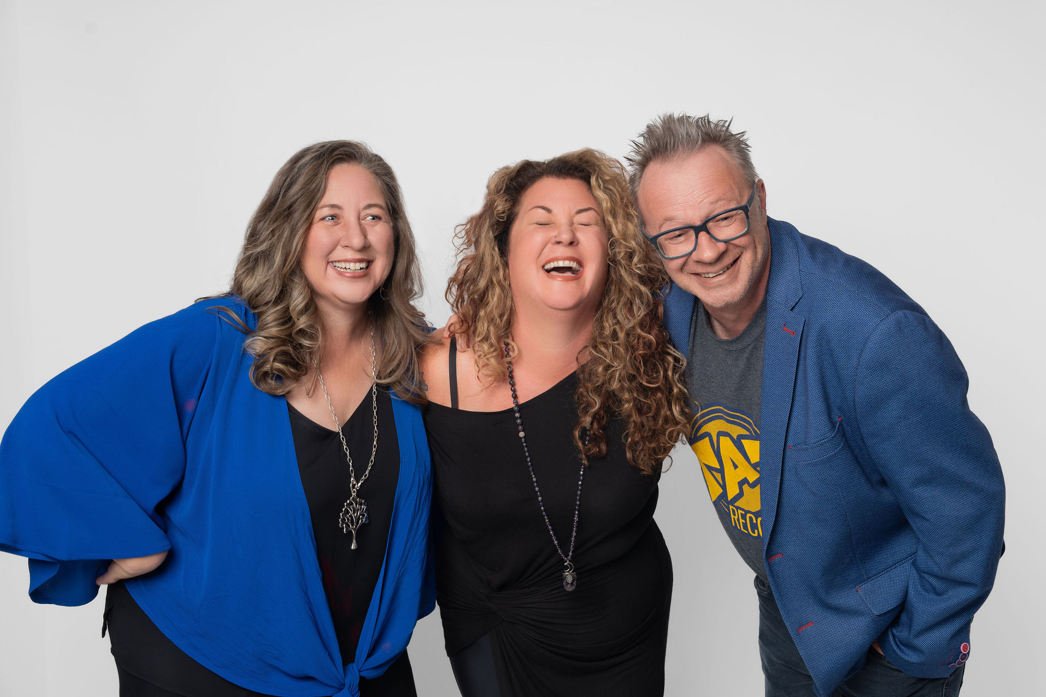 Emma Chevarie, Krista Touesnard and Rob Pinnock of the MRTI Agency pose for a photo.